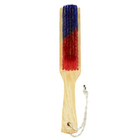 Wooden brush with red and blue bristles on a white background